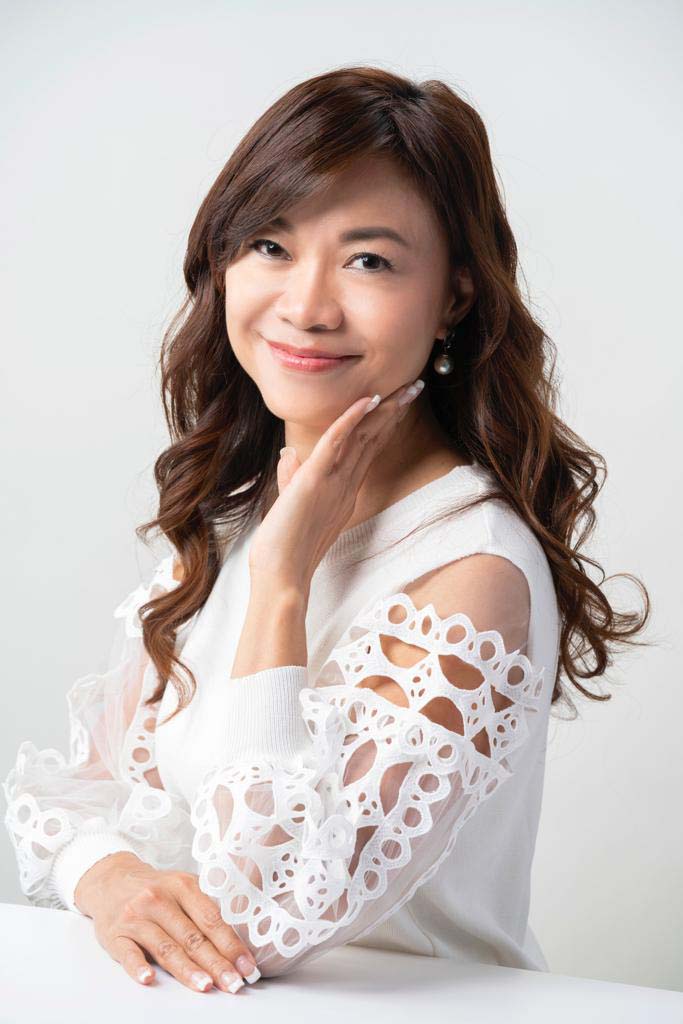 Cindy Portrait White BG Cindy portrait in a white dress